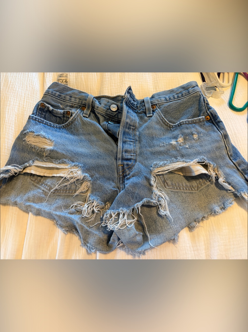 Levi's Distressed Light Blue Denim Cutoff Shorts